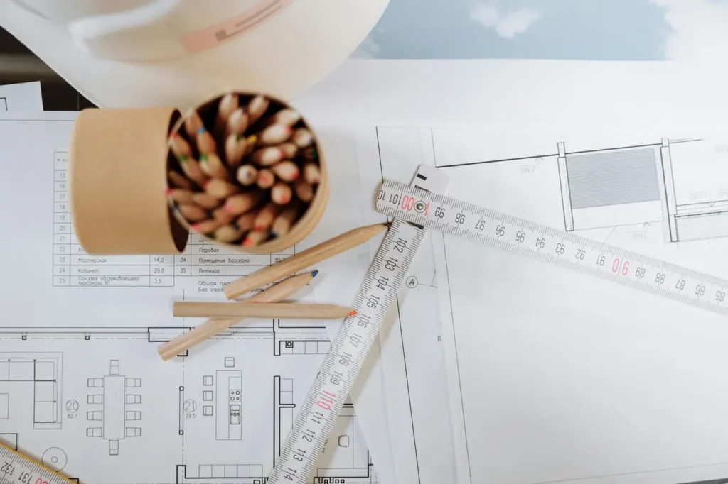 Infografika przedstawiająca rozkład kosztów budowy domu z podziałem na etapy inwestycji